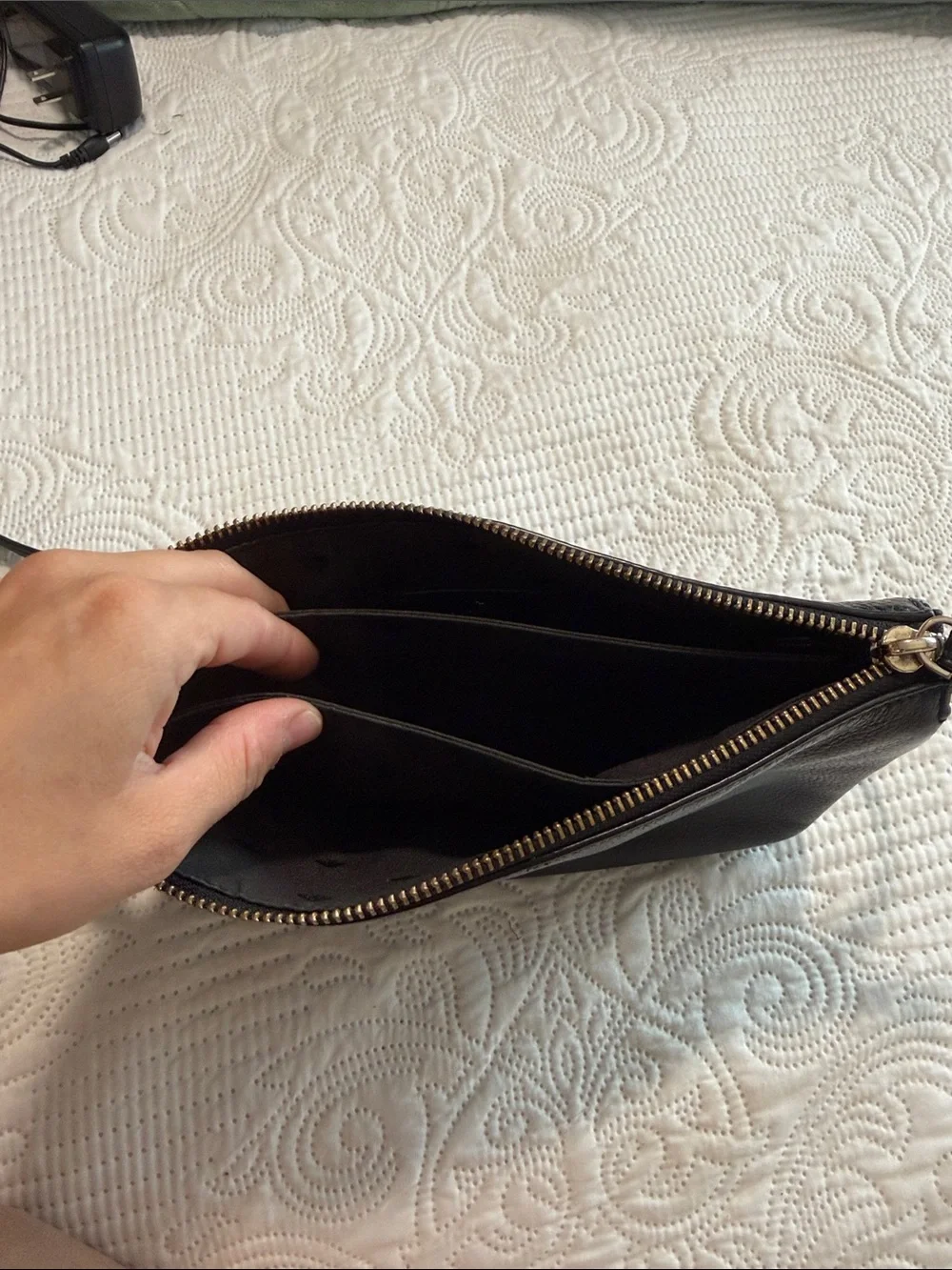 kate spade black leather wristlet with gold zipper